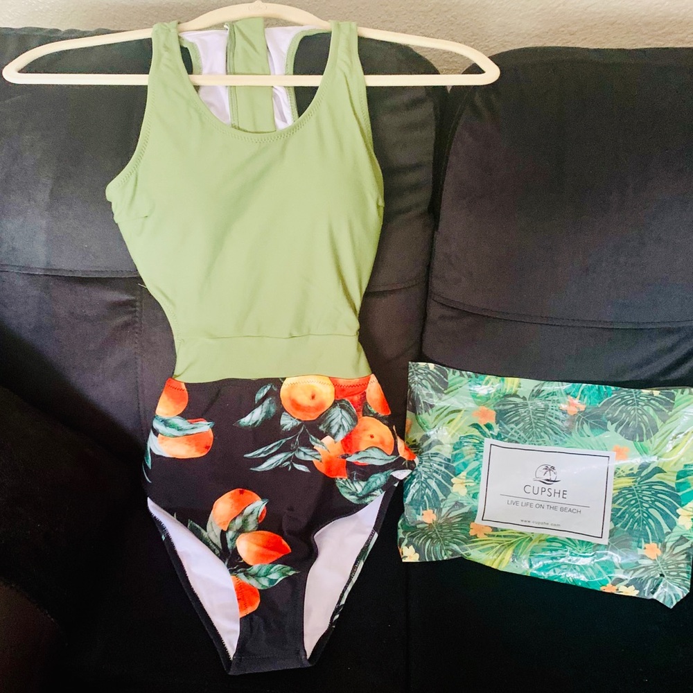 One piece NWT bathing suit open in the back S.